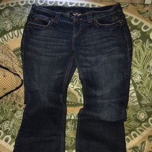Woman’s size 8 “Harley Davidson” boot cut jeans.